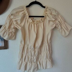 Smocked cream blouse